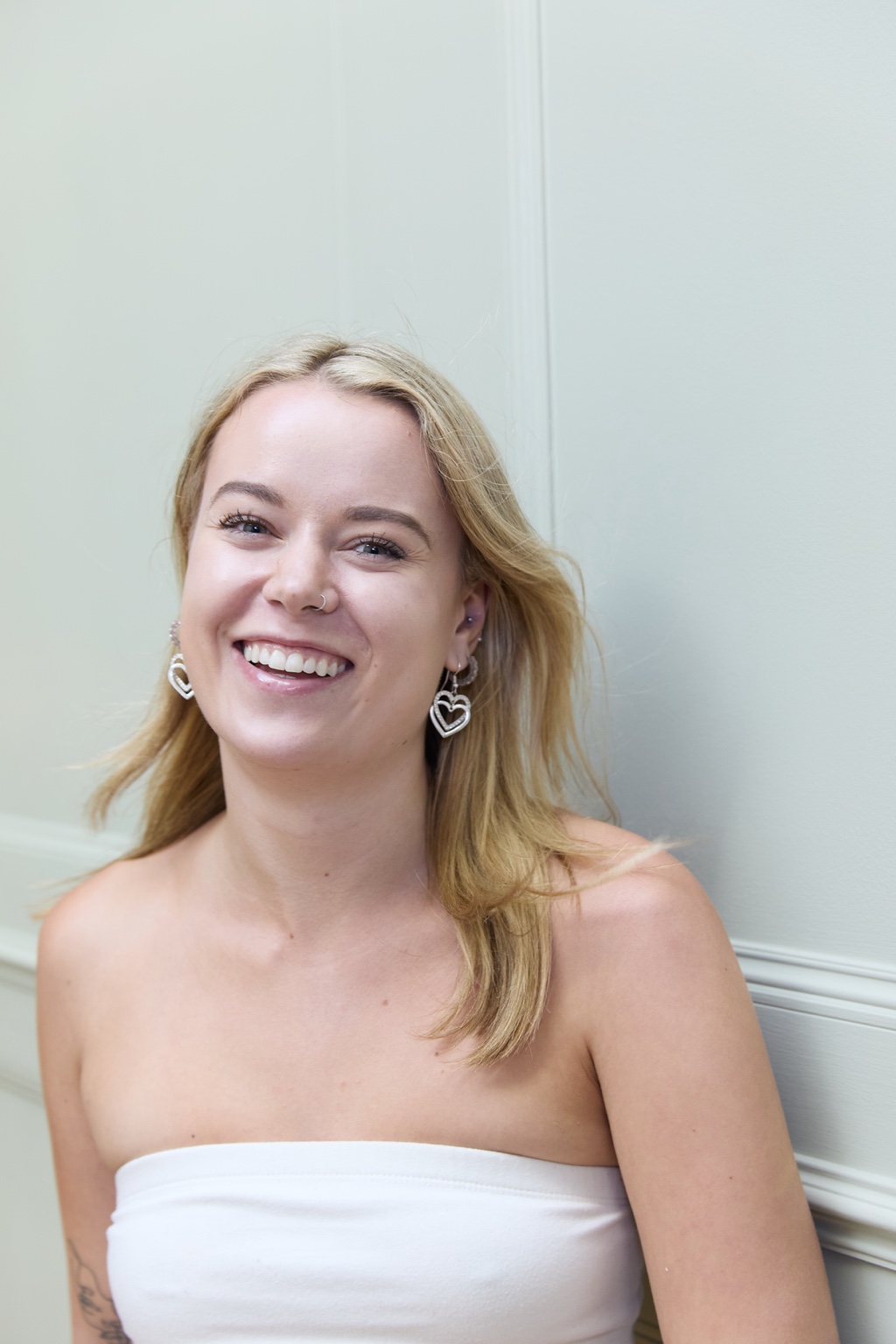 Niamh laughing in a bright commercial portrait